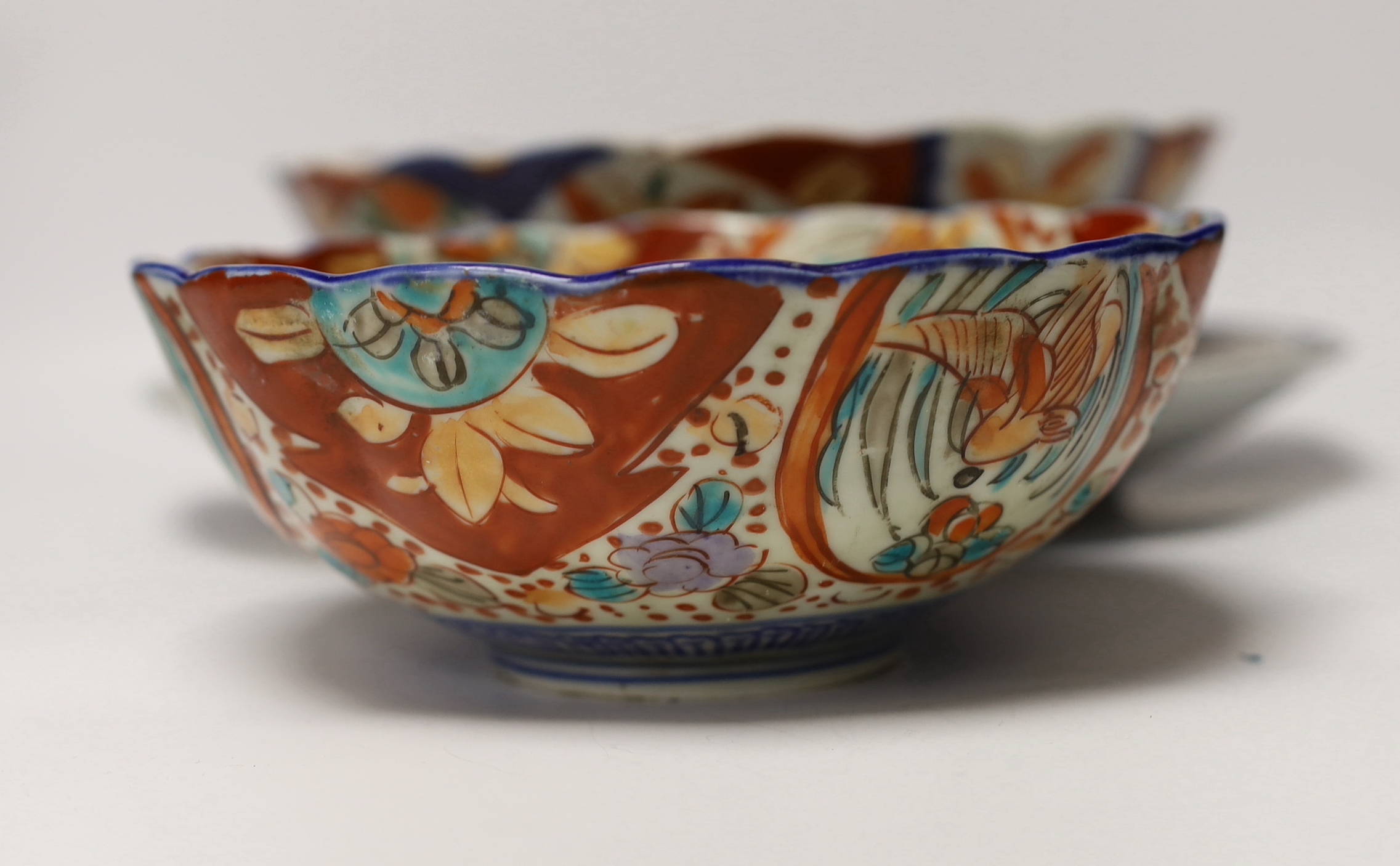 A group of Japanese Imari and kutani together with a Worcester blue and white saucer and a Chinese famille verte teabowl